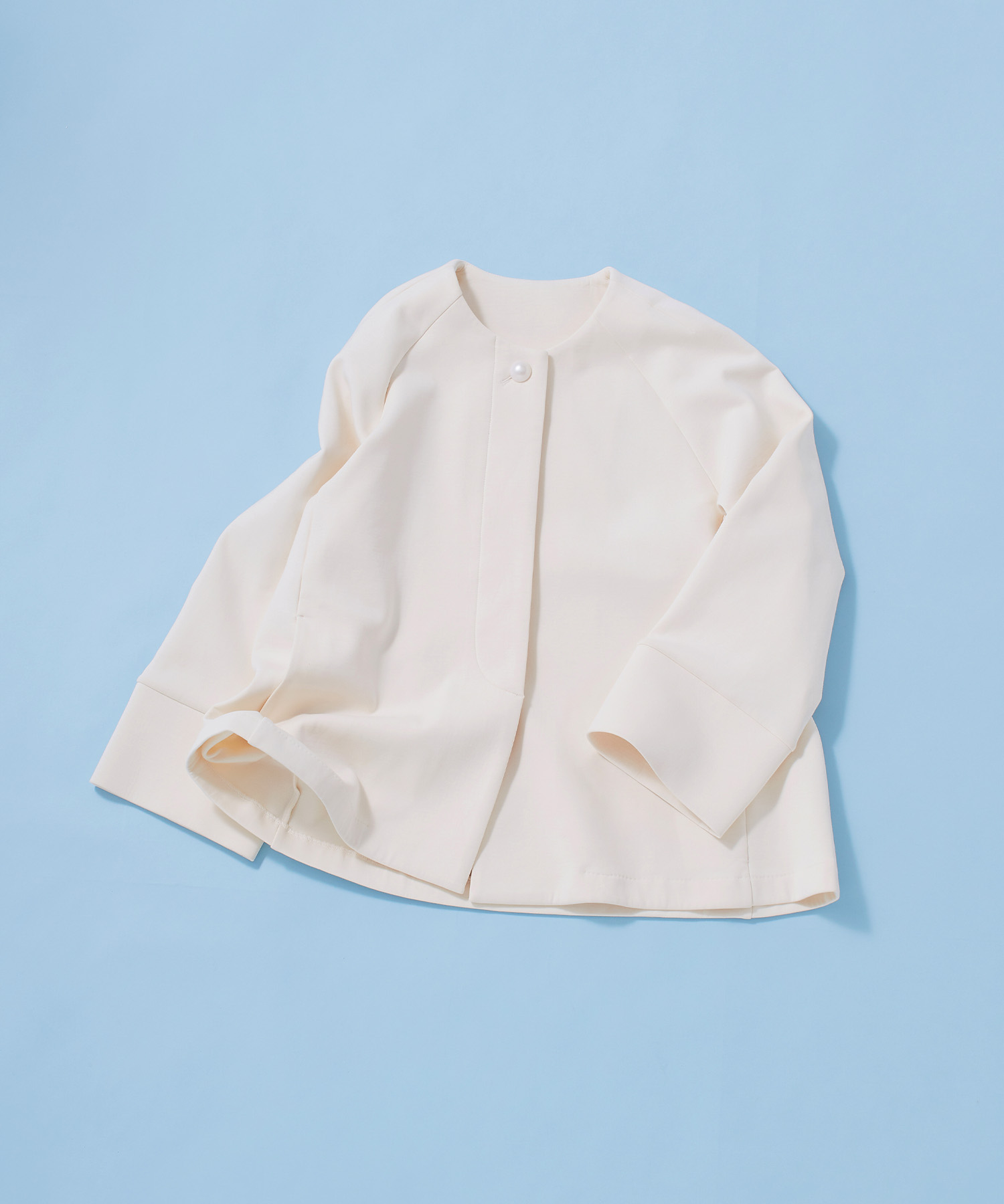 正解 パールボタンAラインコートの画像