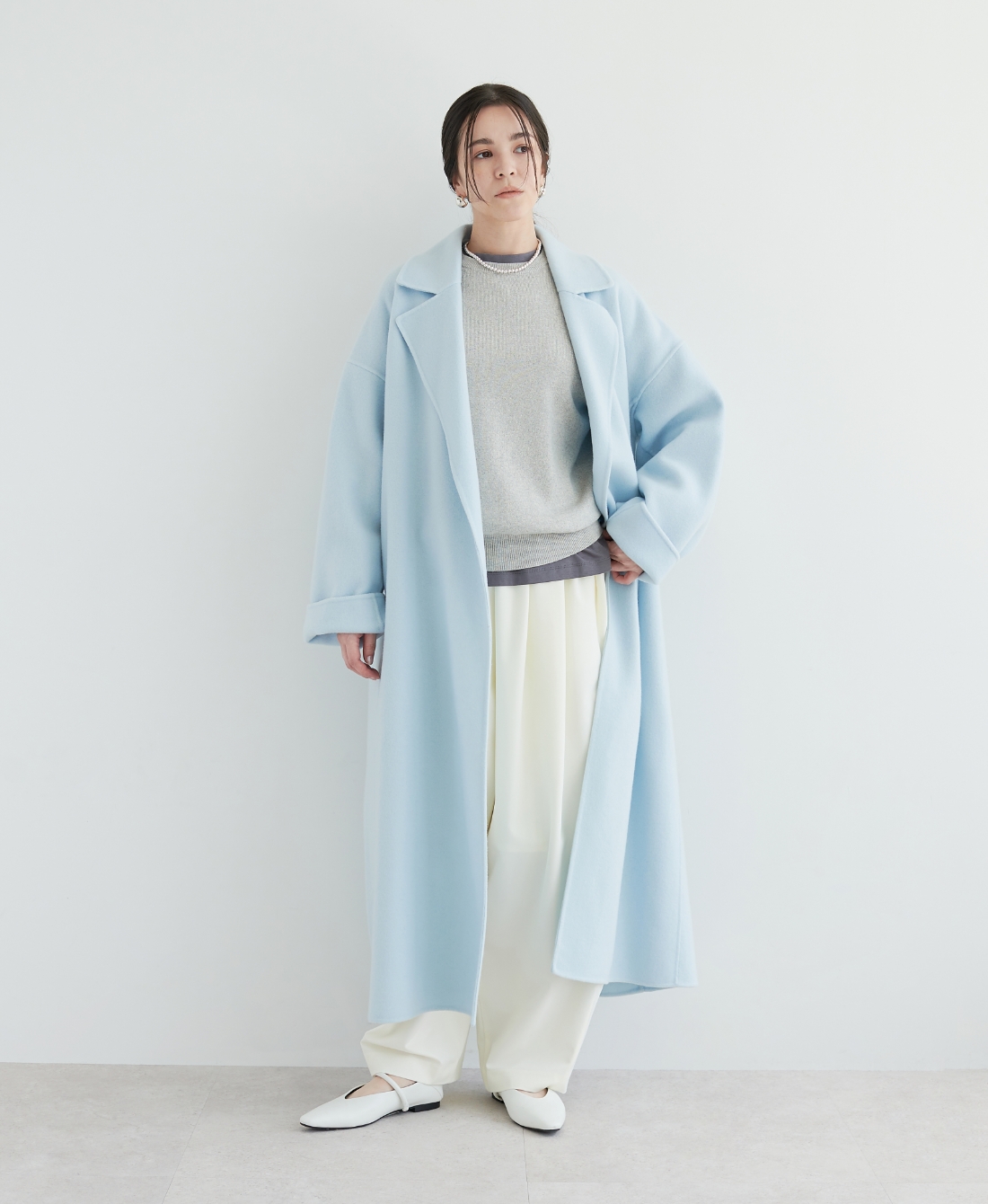 ウールメルトンロングリバーコートを着用しているモデル画像06