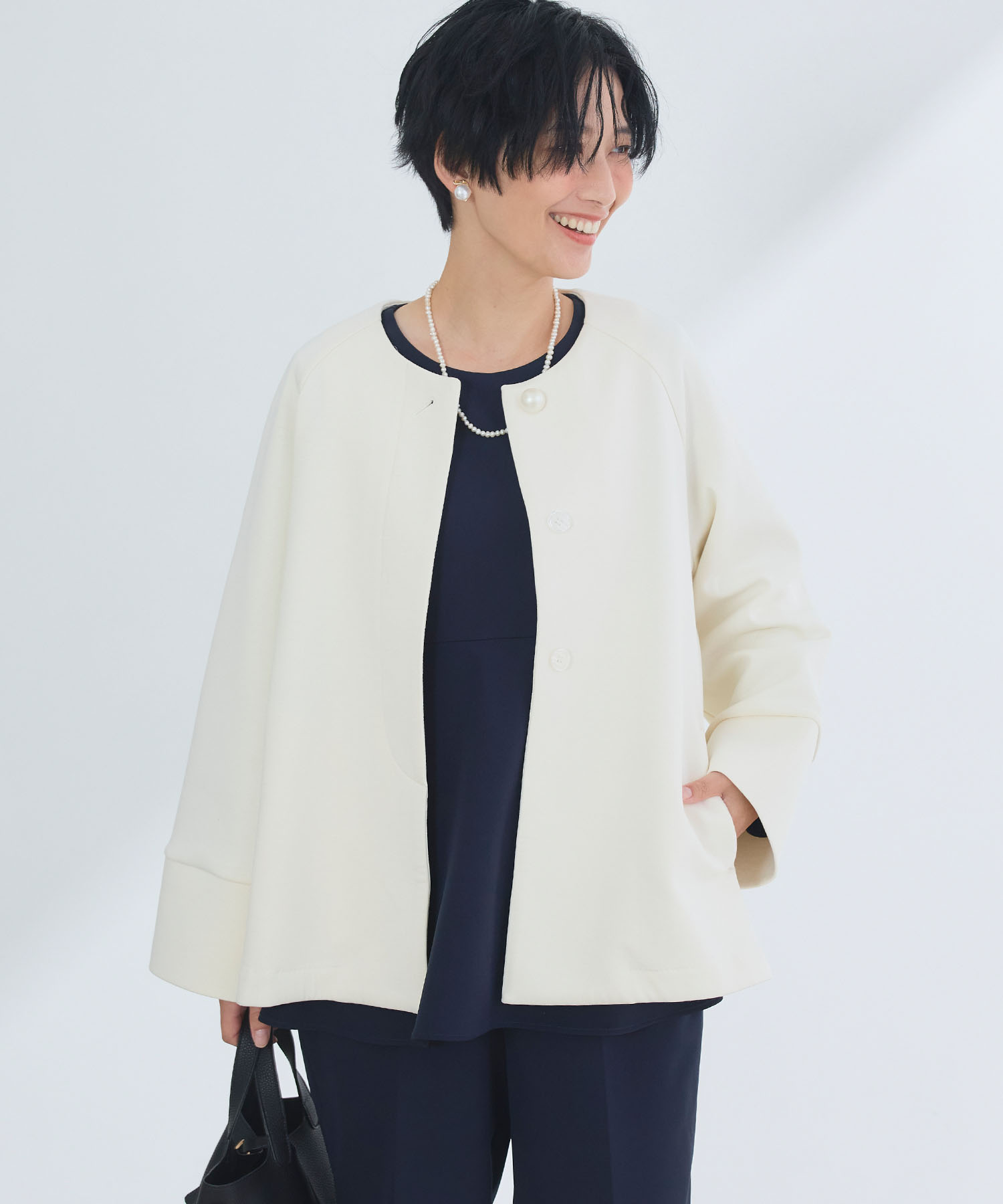 正解 パールボタンAラインコート ¥9,900(tax in) IVORY